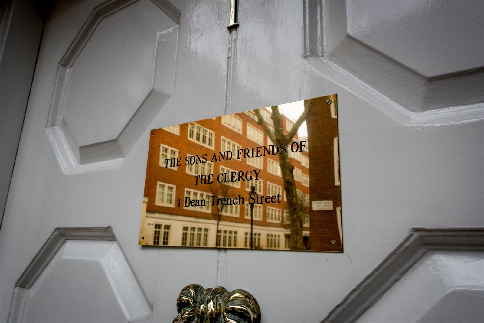 Sons & Friends of the Clergy brass door sign