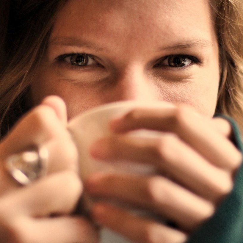 Woman Eyes Cup of Tea Square