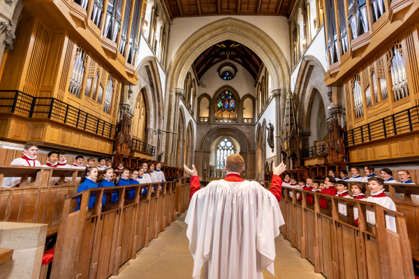 The choir of Llandaff Cathedral, performing in the Cathedral itself.