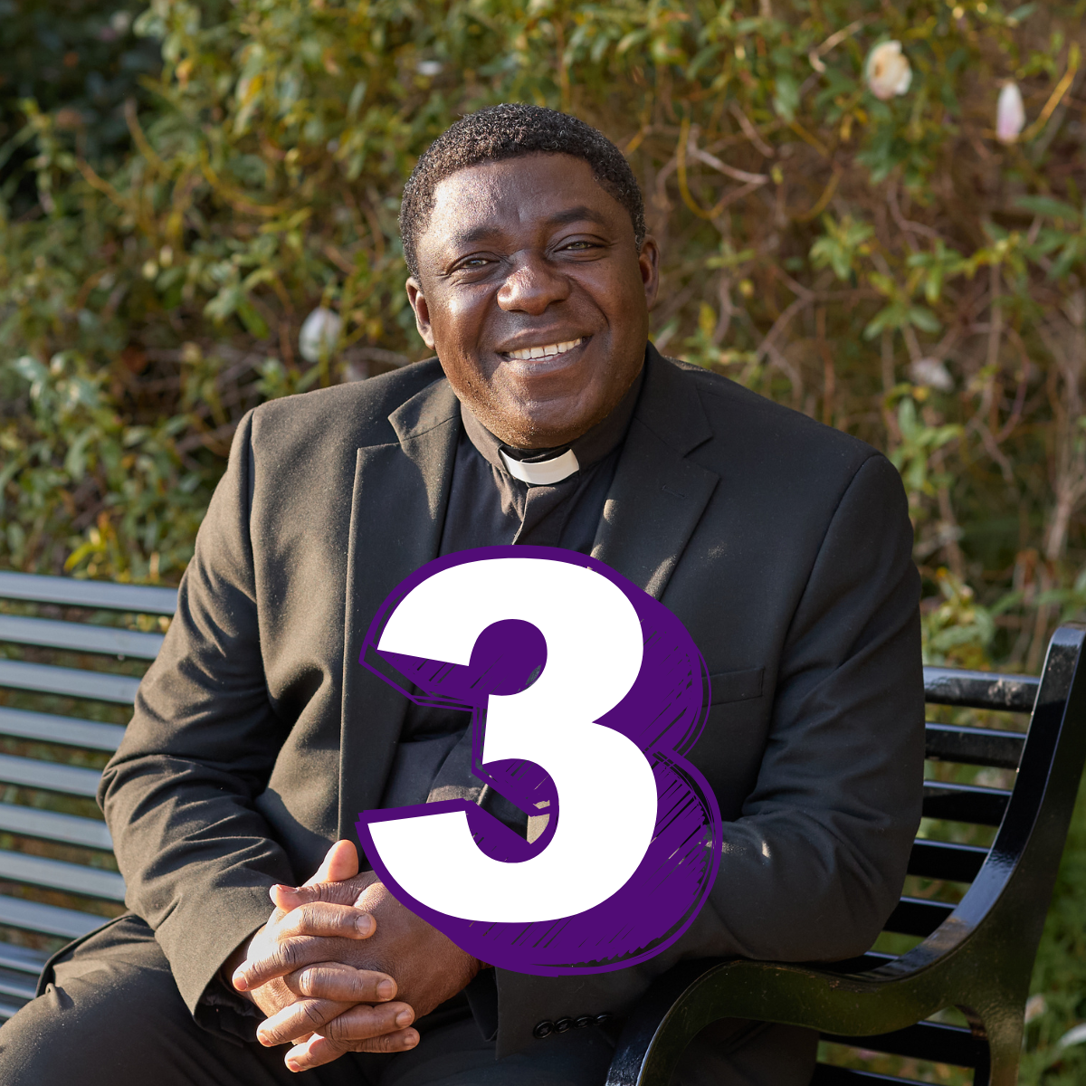 A man in a black suit and a white clerical collar is sat on a park bench. Text reads: Three.