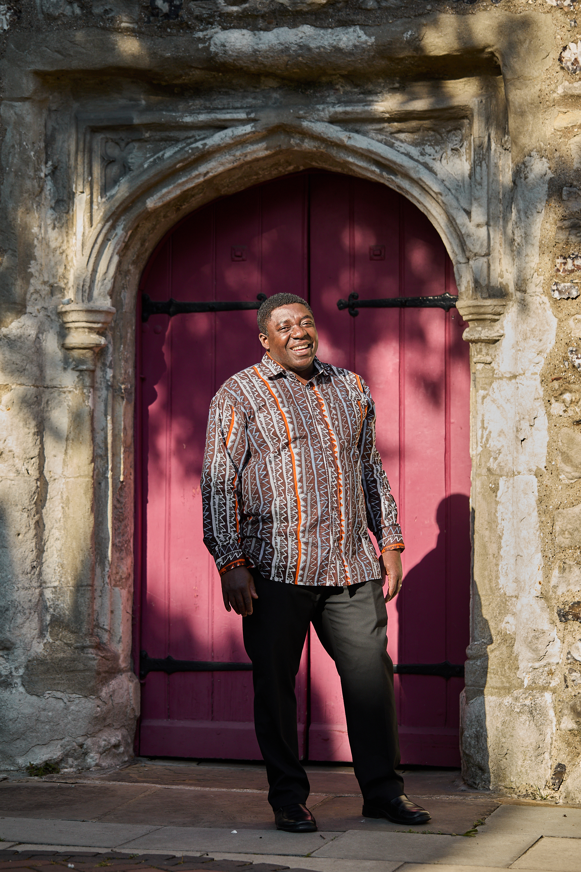 clergy person in doorway