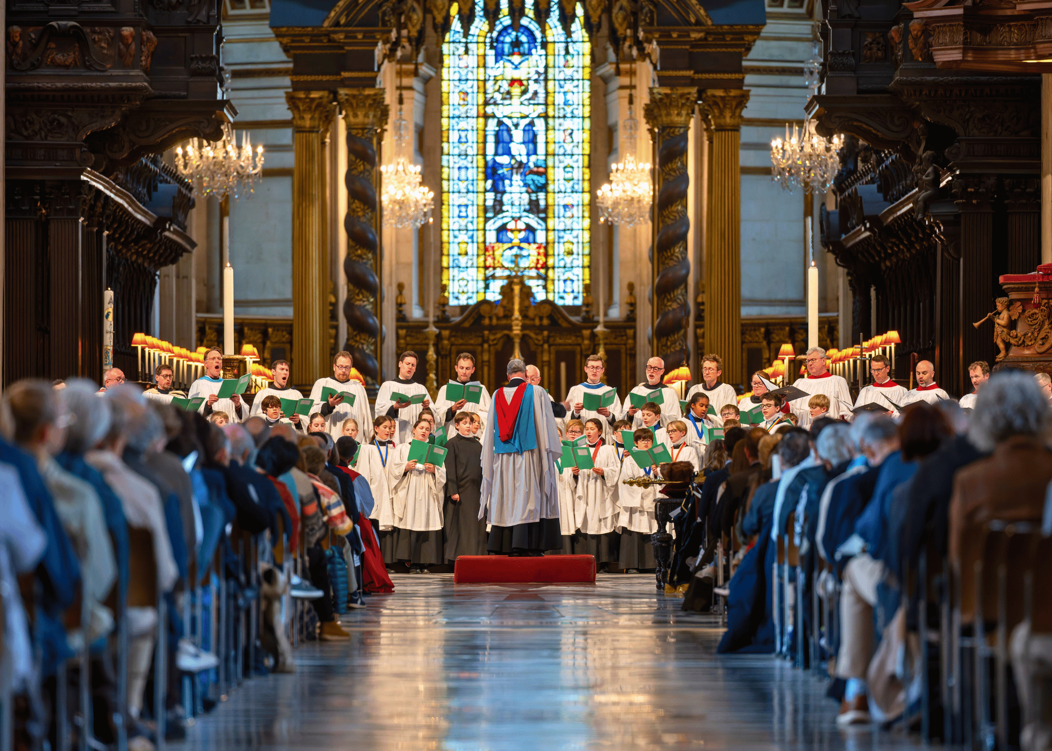 The combined choirs of Blackburn, St Albans and St Paul's Cathedral are led in song by the Director of Music, Andrew Carwood MBE.
