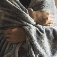 Woman holding blanket